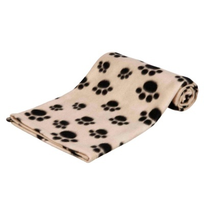 Manta bege com pegadas pretas