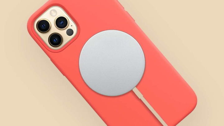 Telemóvel com capa coral e carregador magnético branco circular