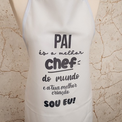 Avental branco com texto em português sobre ser o melhor chef