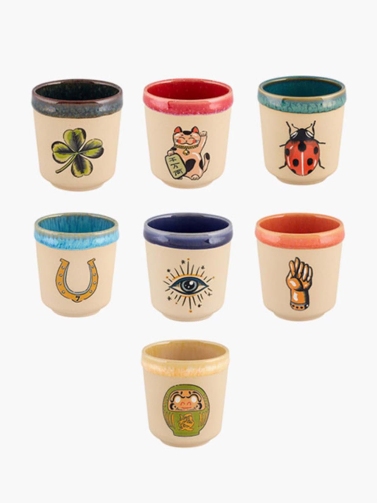 Copo de Café Lucky Shot Sete copos de cerâmica pequenos com diferentes símbolos pintados