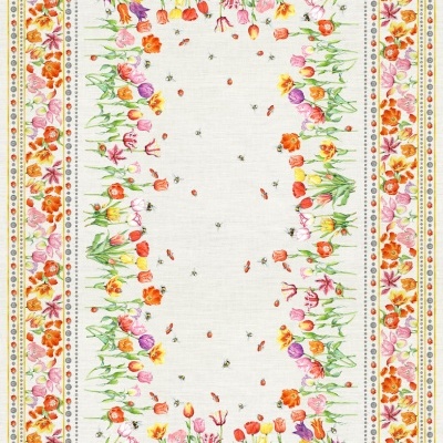 Toalha de mesa branca com padrão floral colorido e pequenas abelhas no centro.