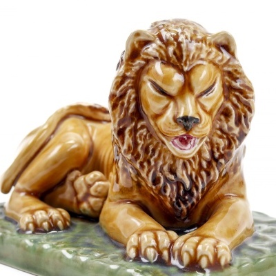 https://www.pinheirobravo.pt/product/bordallo-pinheiro-paliteiro-leao-deitado