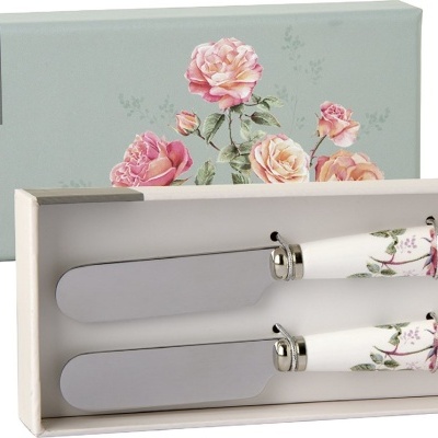 https://www.pinheirobravo.pt/product/conjunto-de-2-faquinhas-para-a-manteiga-rosa-12cm-ihr