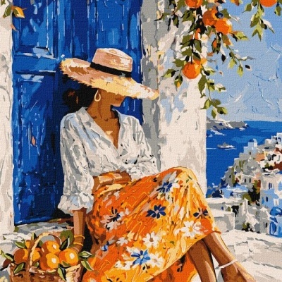 Mulher com chapéu de palha e saia florida sentada junto a porta azul numa cidade costeira