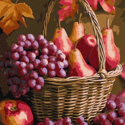 Cesta de verga com frutas e folhas de outono