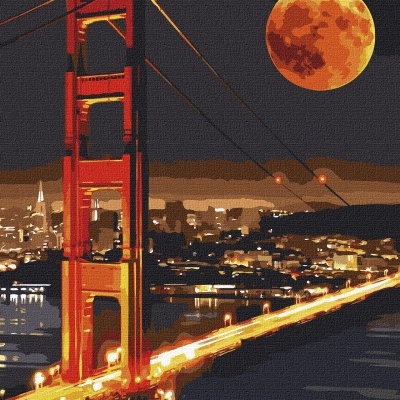 Golden Gate Bridge iluminada à noite com lua cheia laranja ao fundo