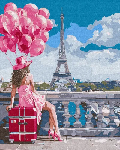 Mulher com vestido rosa, chapéu e balões sentada em mala vermelha com Torre Eiffel ao fundo