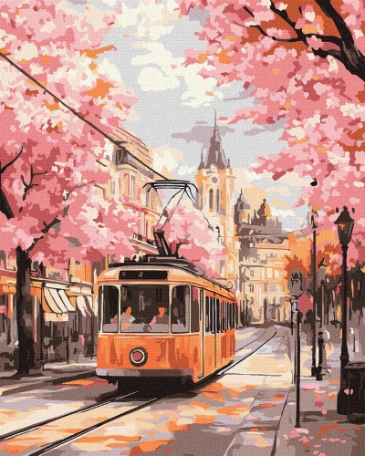 Elétrico cor-de-laranja em rua com árvores rosa e edifícios clássicos