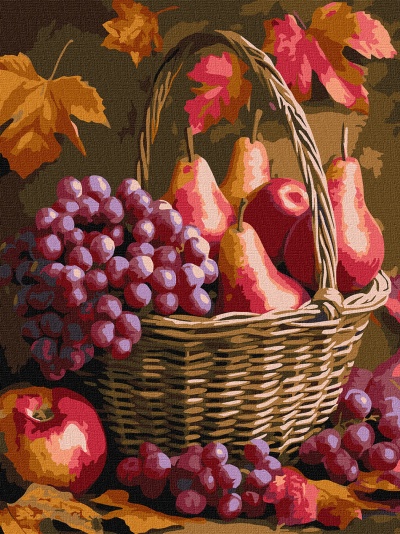 Cesta de verga com frutas e folhas de outono