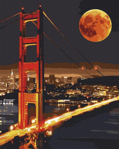 Golden Gate Bridge iluminada à noite com lua cheia laranja ao fundo