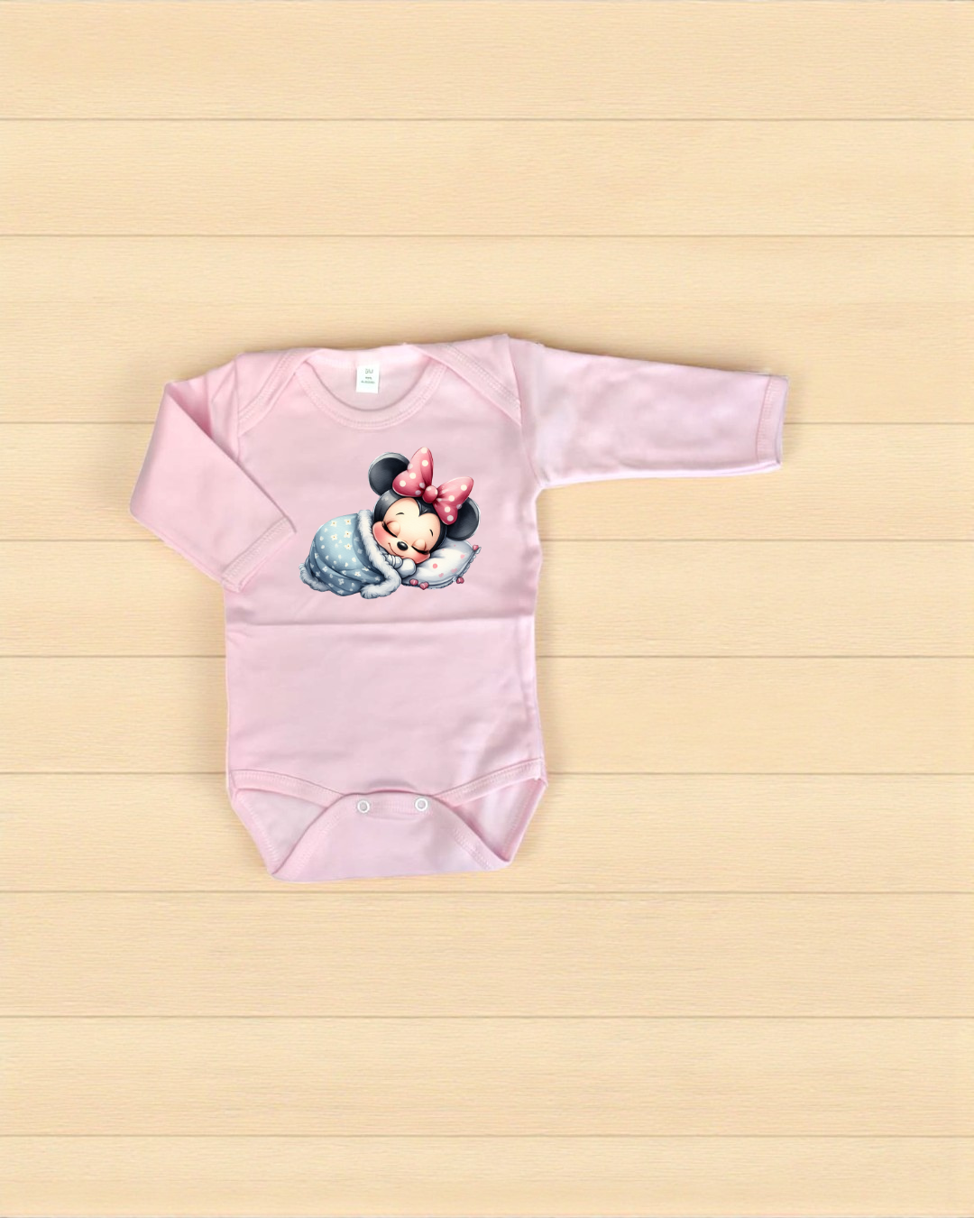 Body de bebé rosa com ilustração da Minnie Mouse a dormir