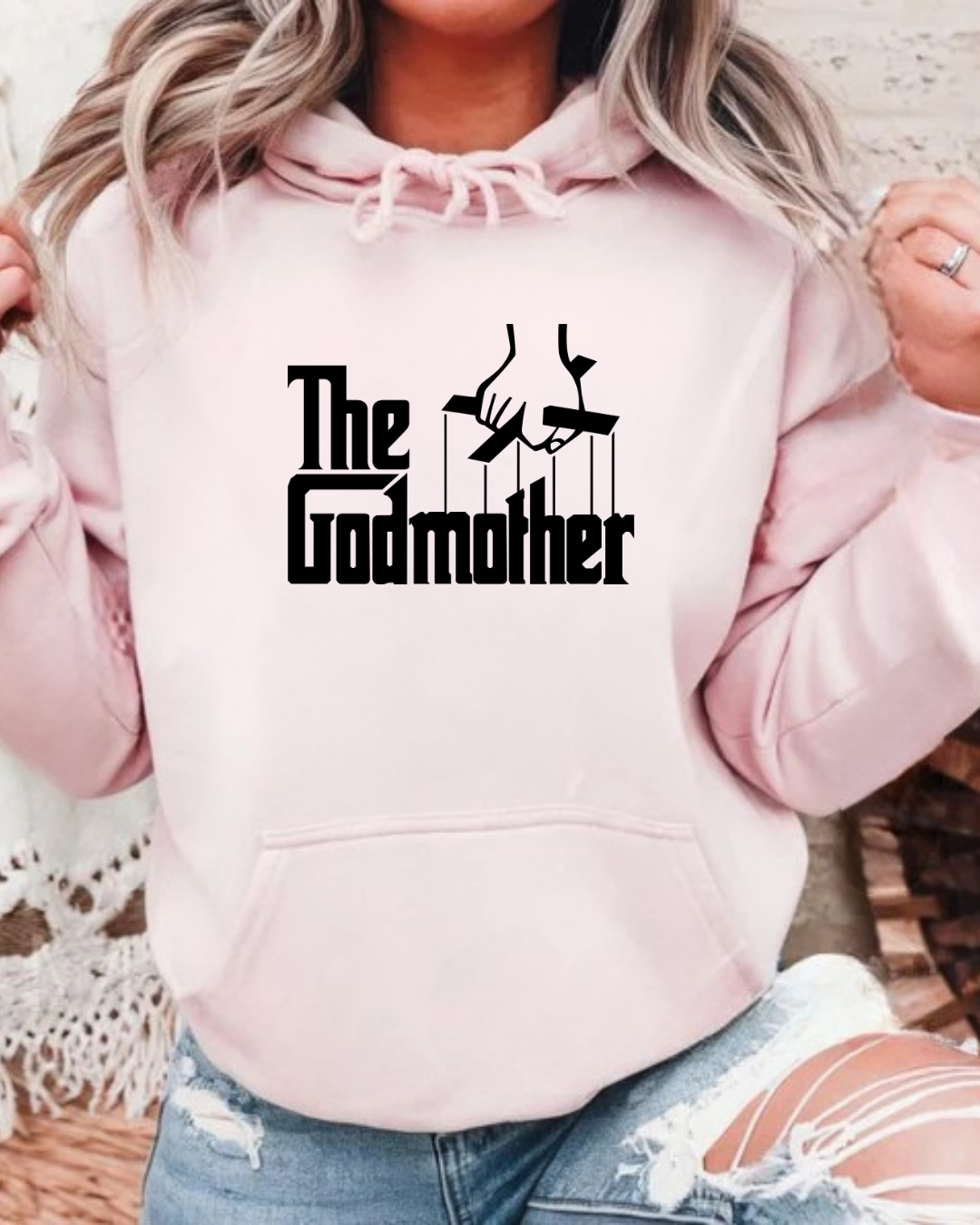 Sweatshirt rosa claro com estampado preto 'The Godmother' e design de mãos com cordas