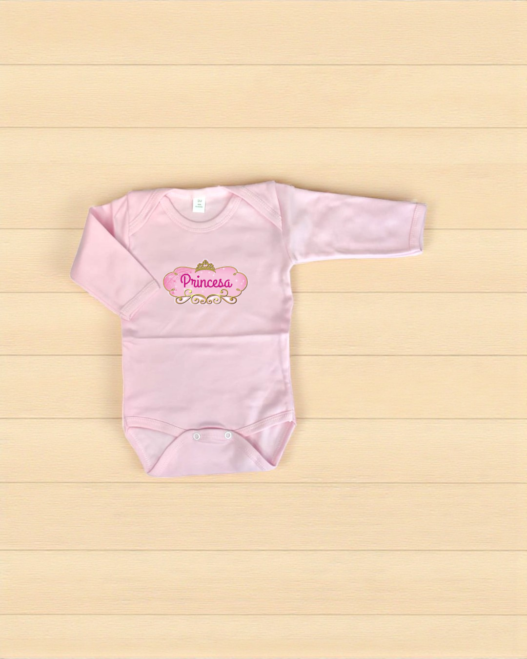 Body de bebé rosa claro com a palavra Princesa e coroa