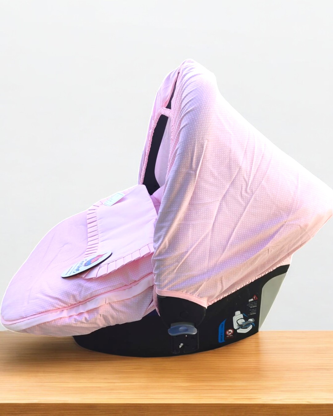 Capa rosa para cadeira de automóvel de bebé