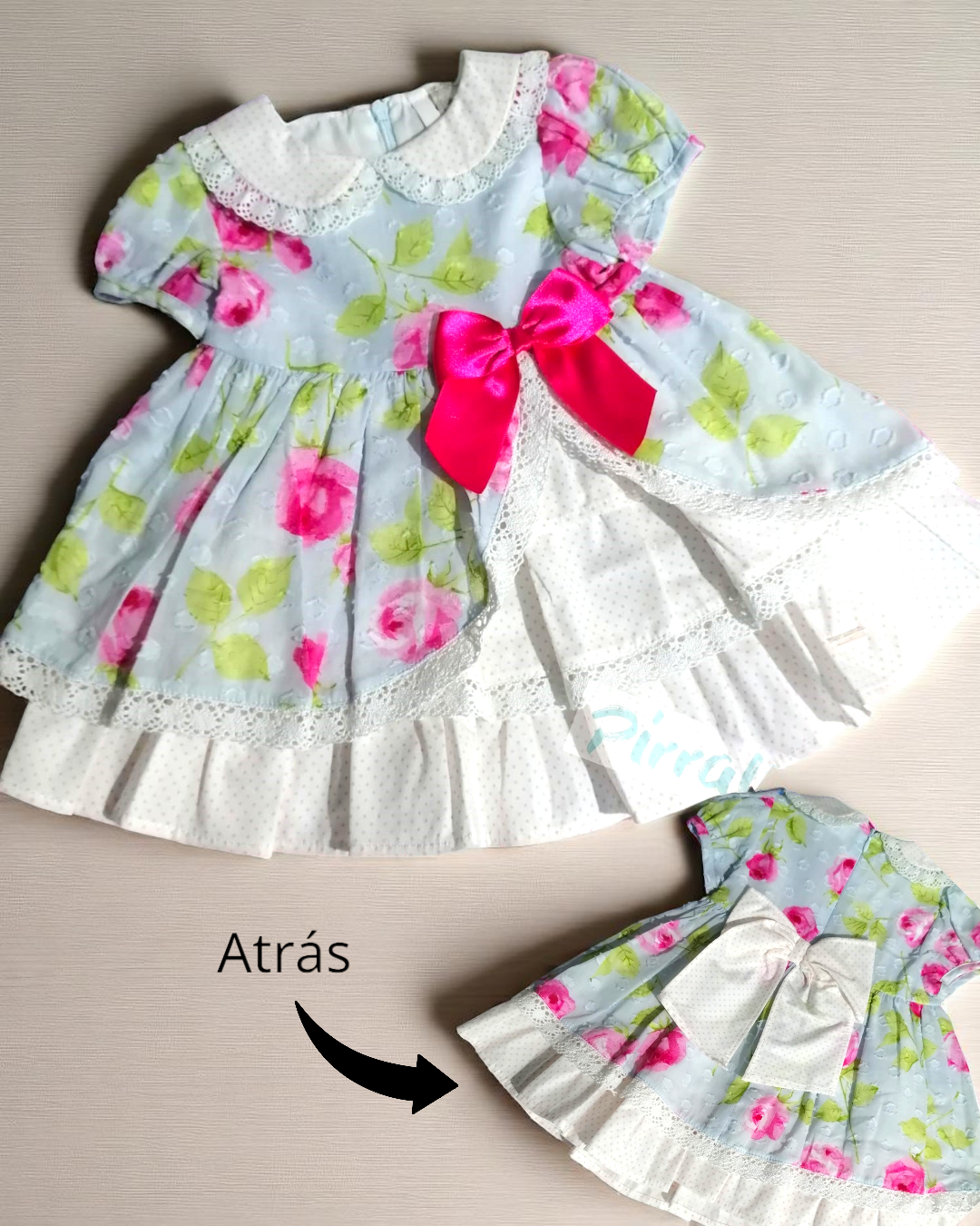 Vestido infantil floral azul com golas e laços brancos e rosa