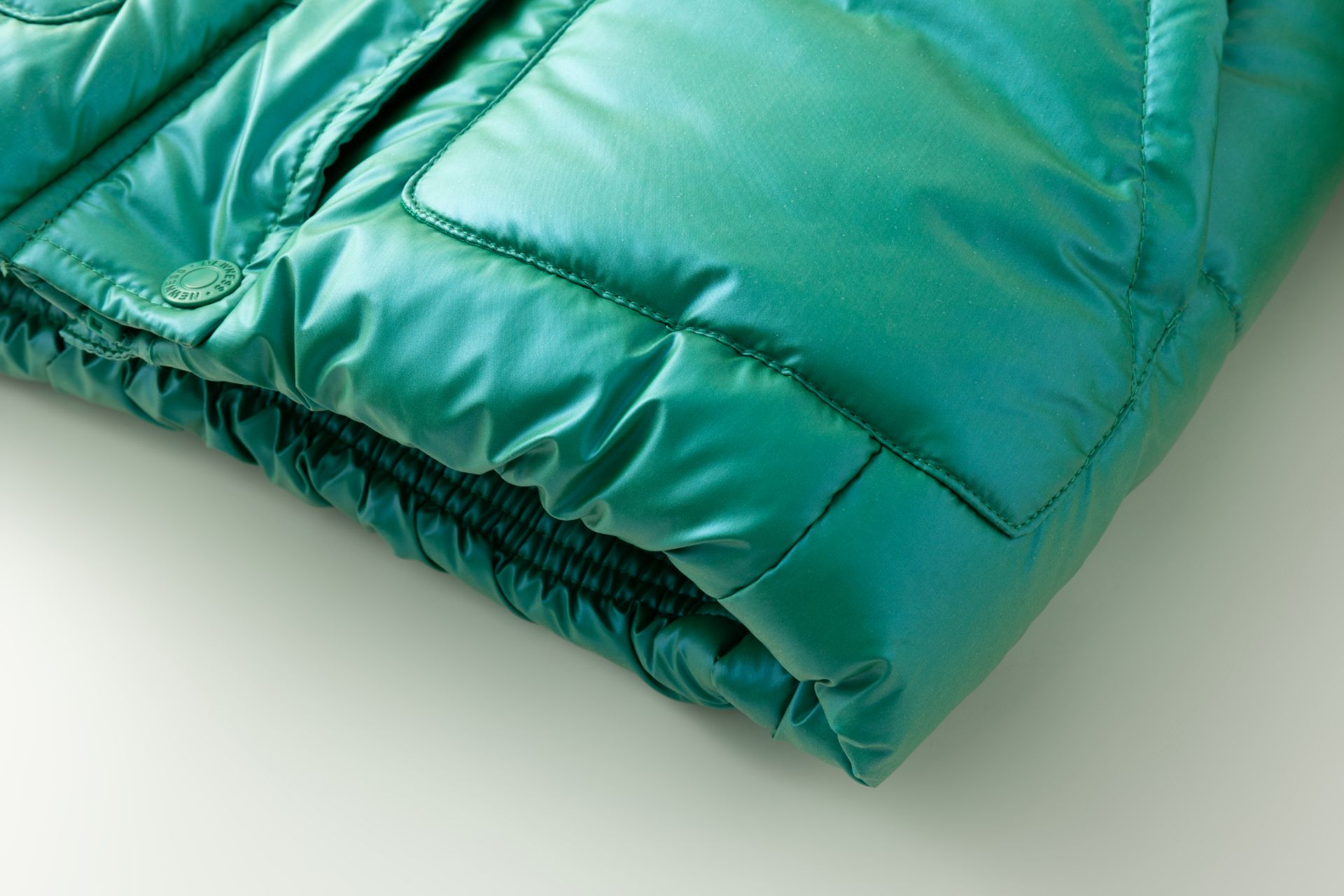 Manga de casaco acolchoado verde turquesa com elástico