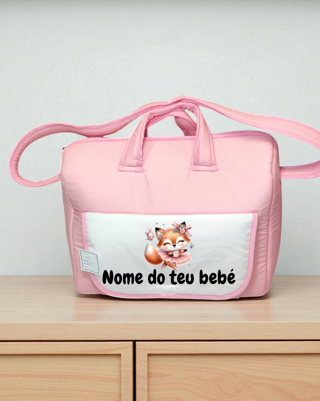 Mala rosa para bebé com bolso frontal branco e desenho de raposa