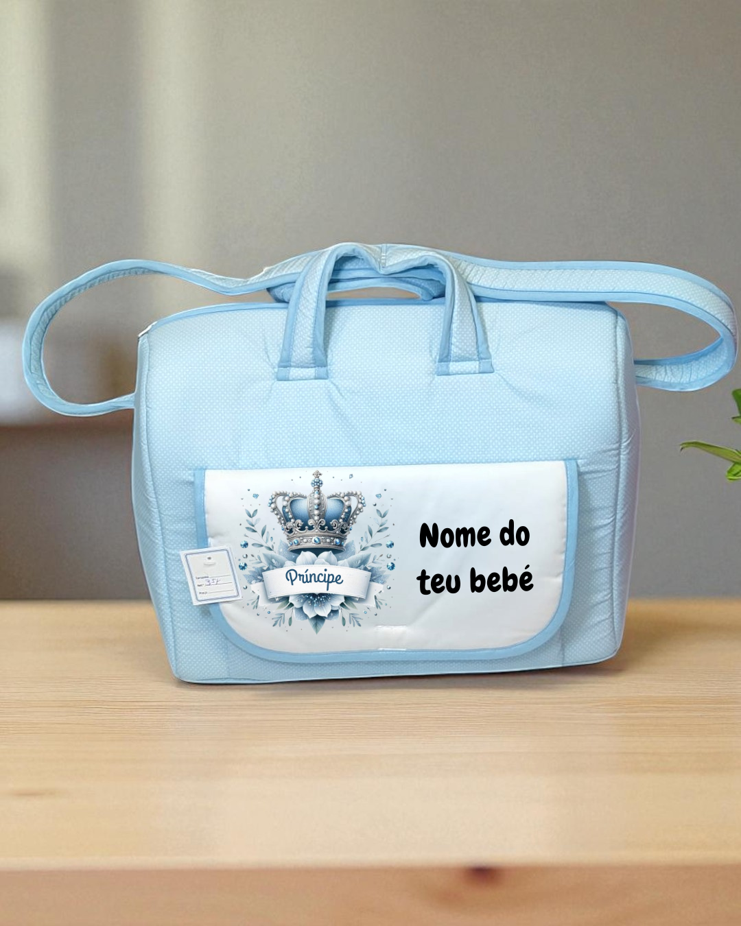 Mala azul para bebé com bolso frontal branco e coroa azul