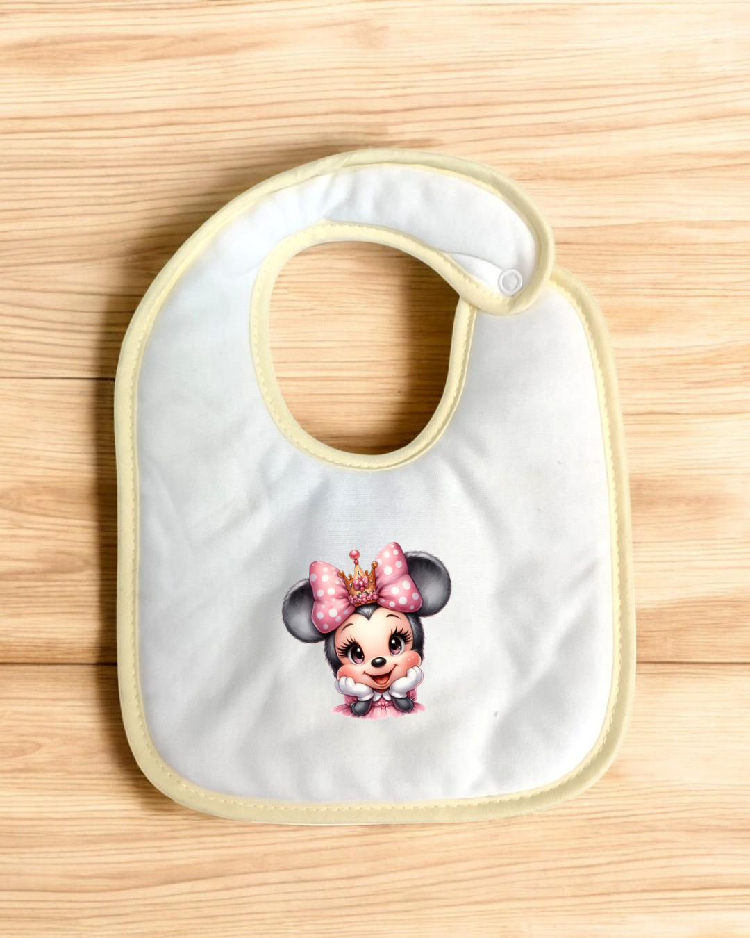 Babete branco com estampado da Minnie Mouse e bordas amarelas
