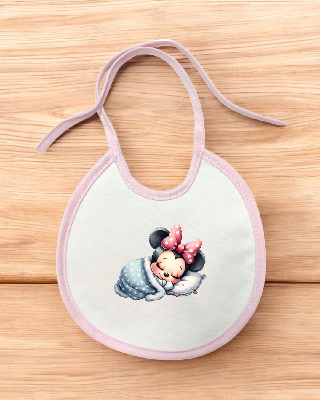 Babete para bebé branco e rosa com imagem da Minnie a dormir