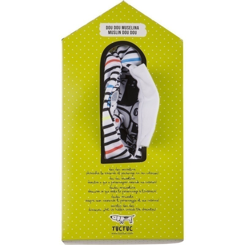 Embalagem verde com pontos brancos e panos de musselina dobrados à vista com texto e logótipo TICTUC