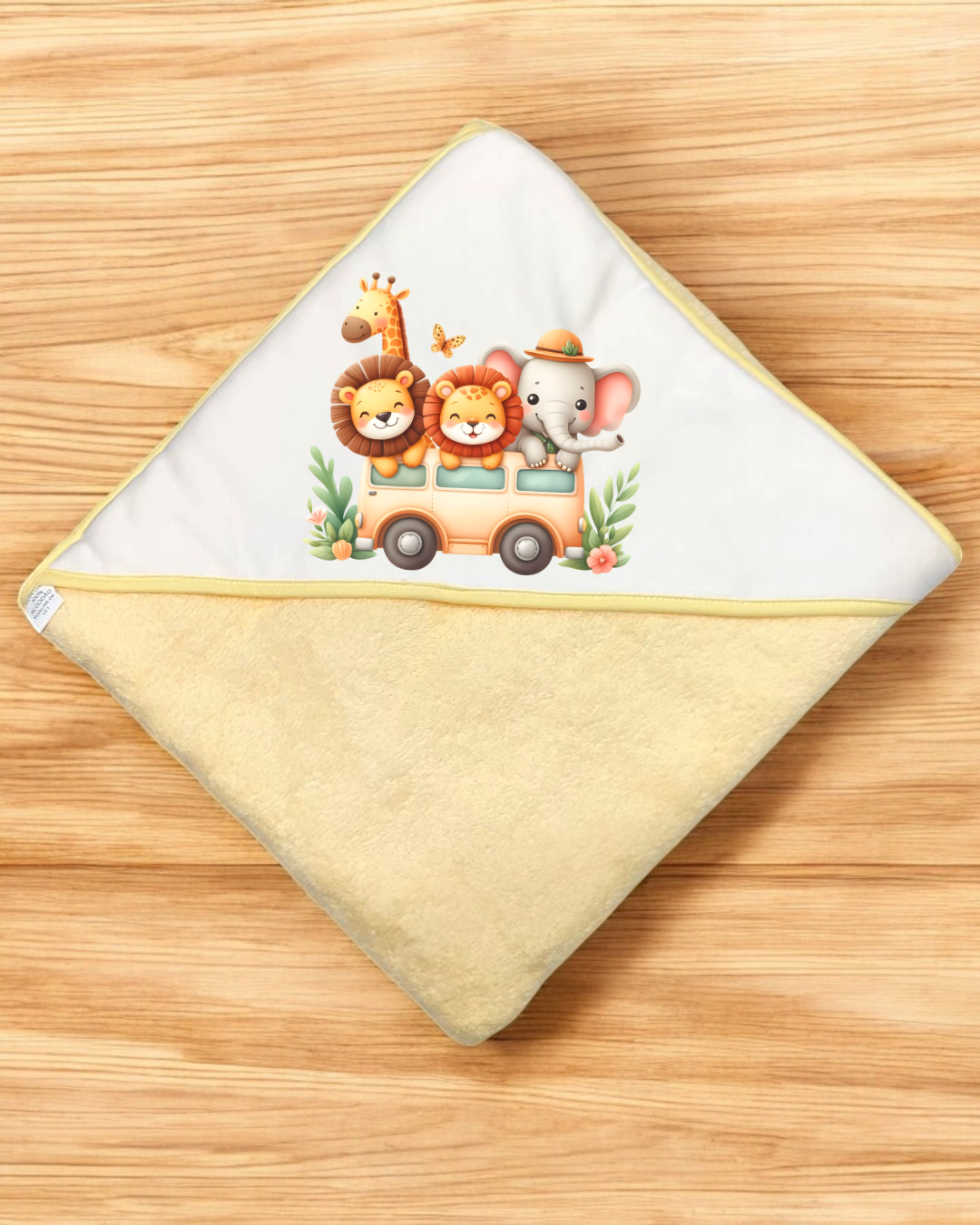 Manta para bebé com capuz e desenho de animais num autocarro