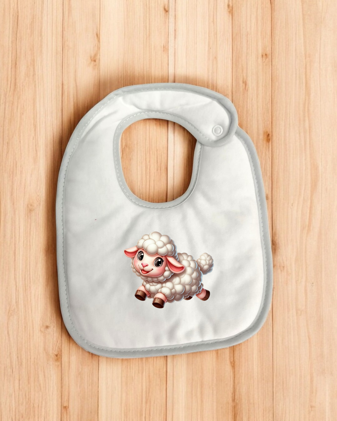 Babete branco para bebé com carneiro desenhado
