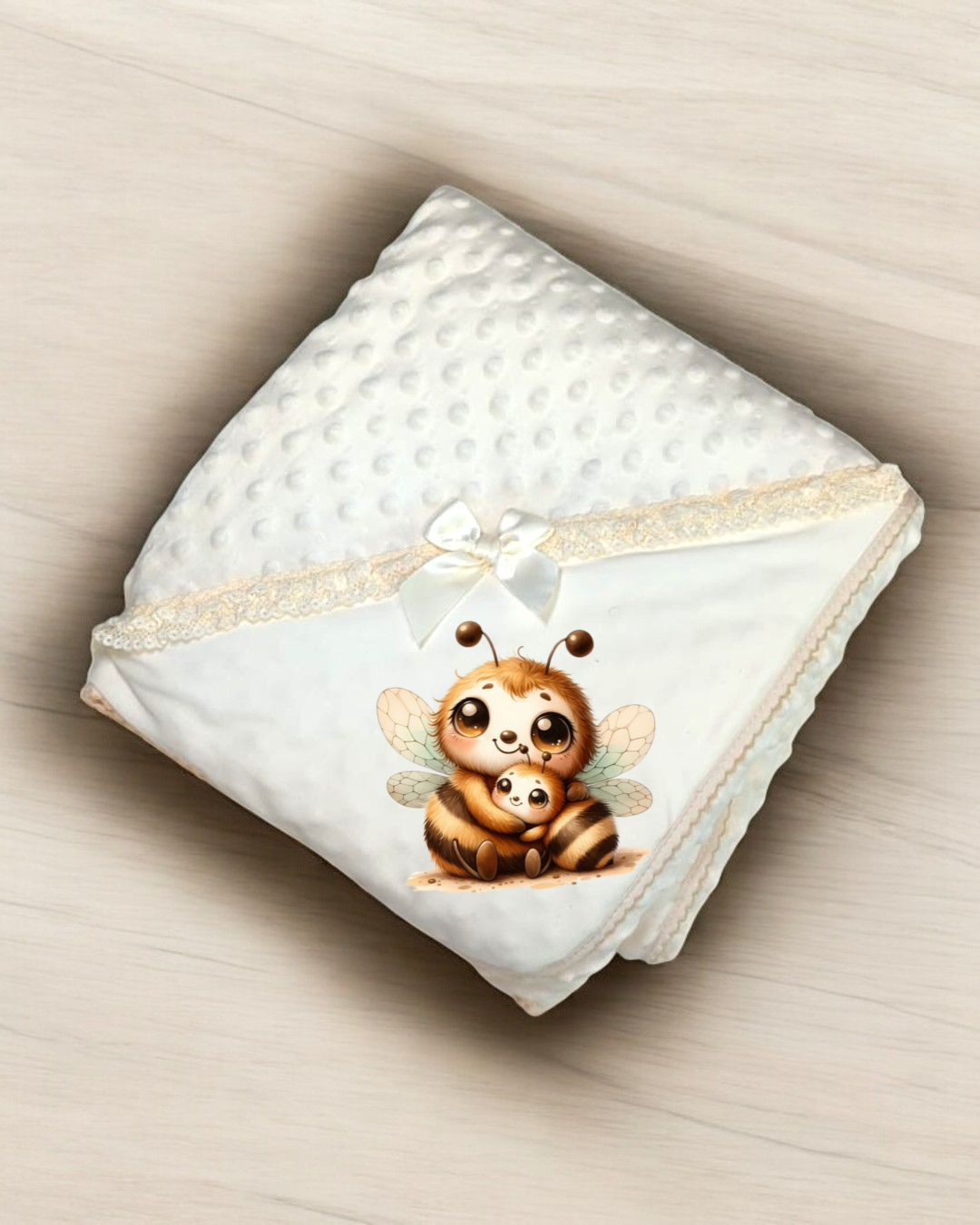 Manta branca para bebé com textura e estampa de abelhas