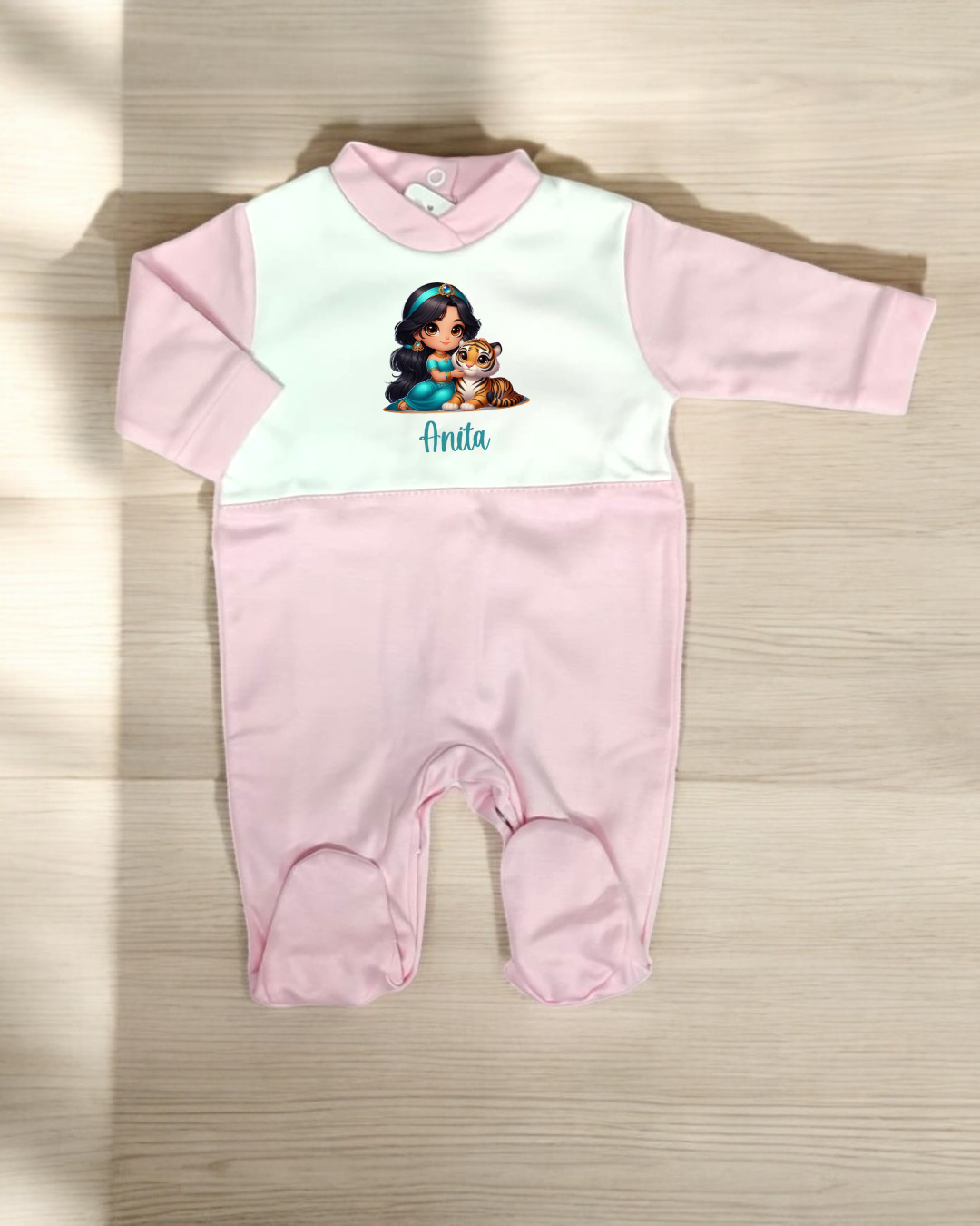 Macacão de bebé cor de rosa e branco com ilustração e nome 'Anita'