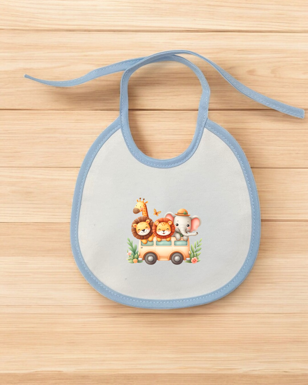 Babete de bebé branco com bordas azuis e ilustração de animais numa carrinha