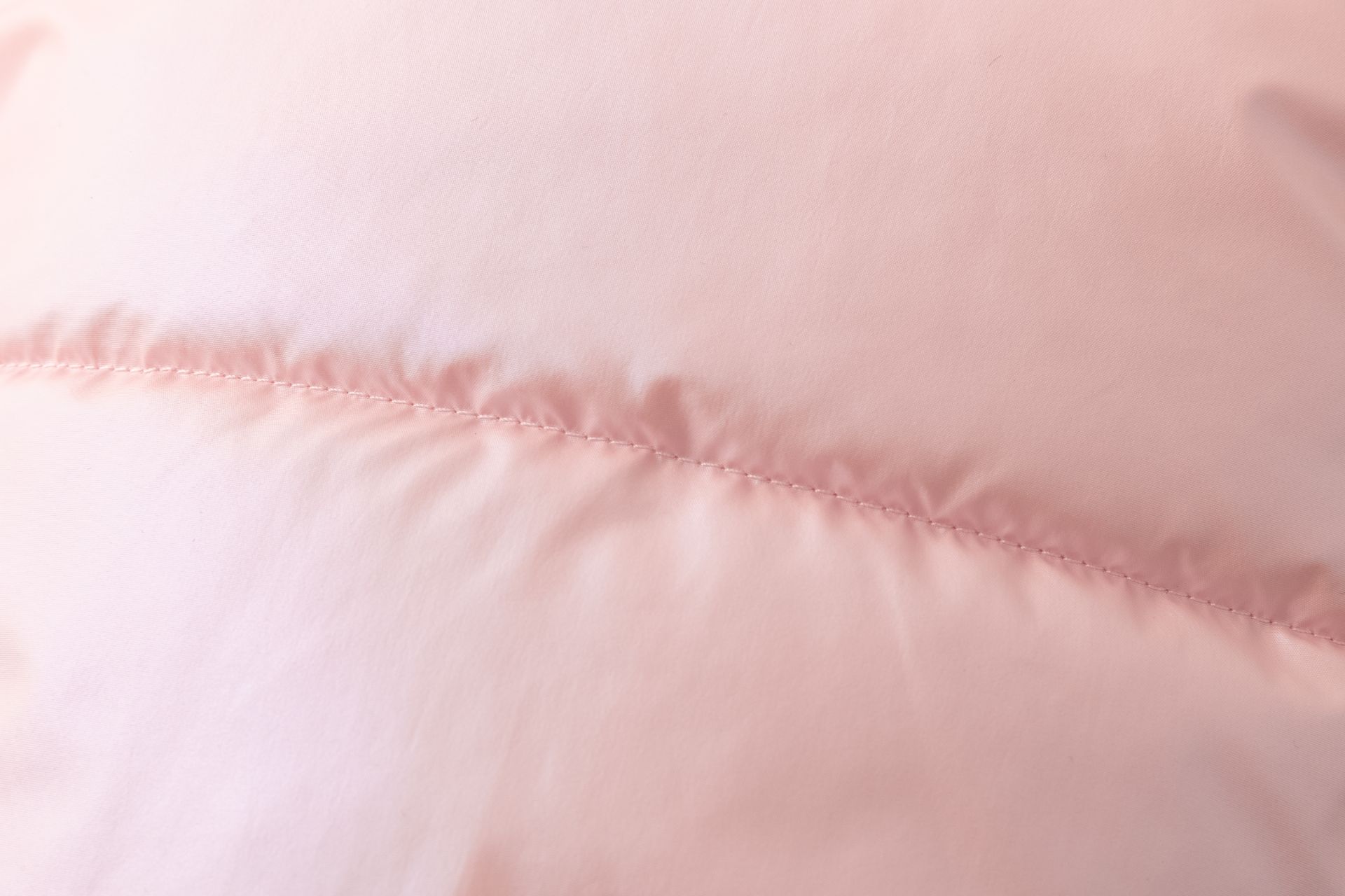 tecido cor-de-rosa claro com costura horizontal