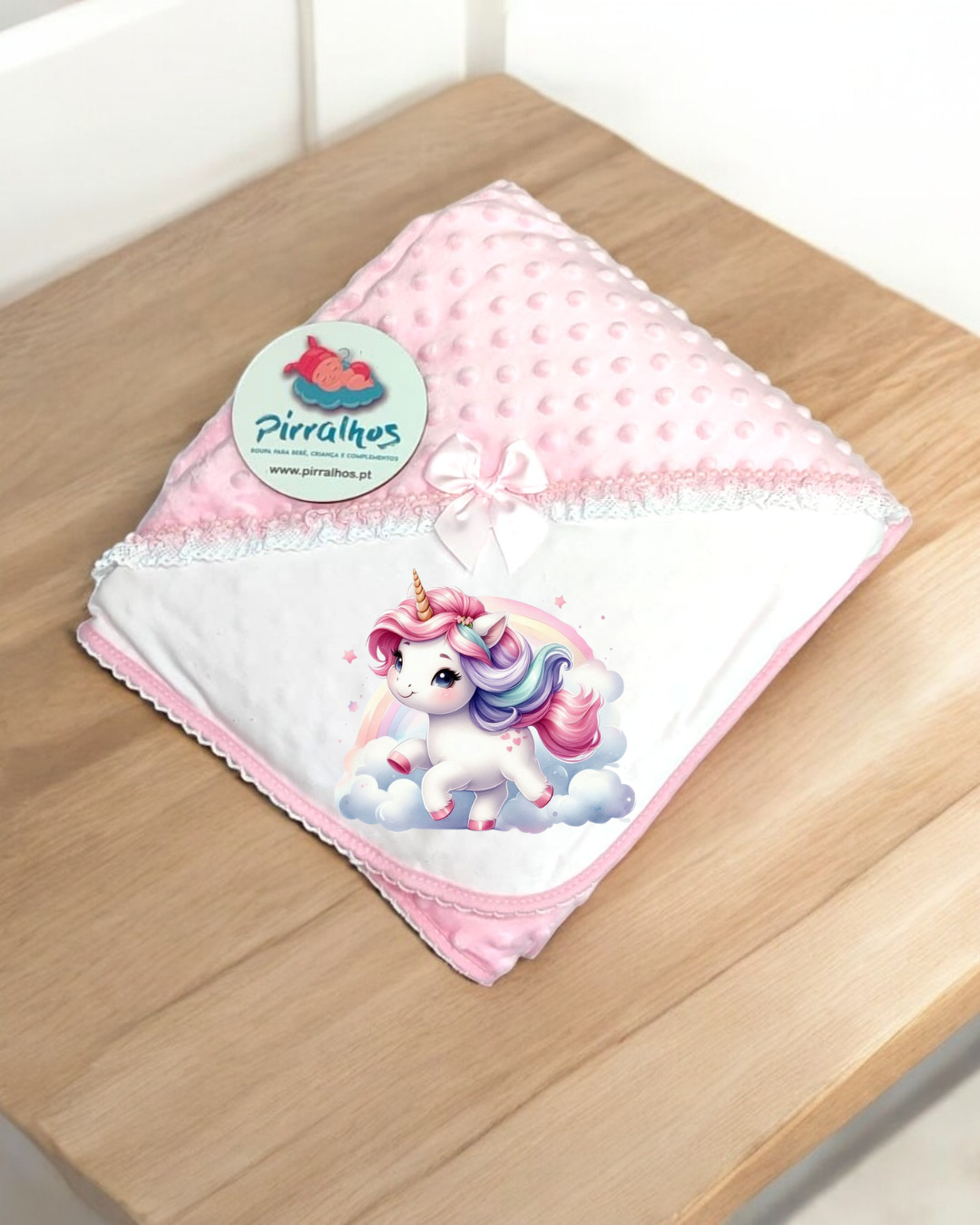 Manta rosa para bebé com unicórnio e etiqueta Pirraltos