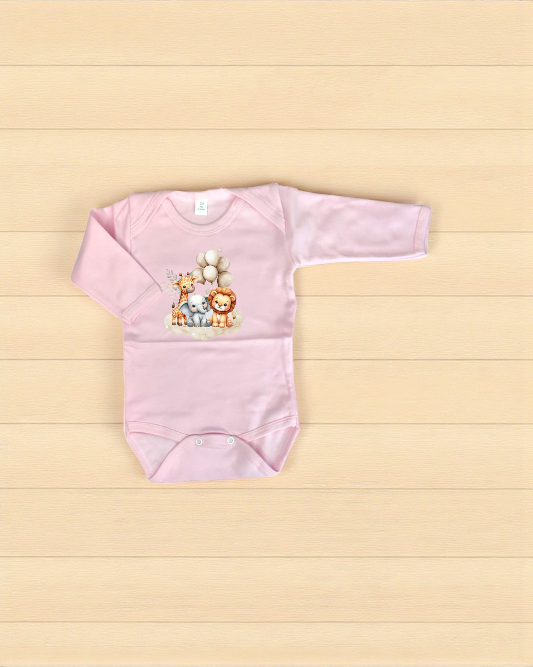 Body de bebé cor-de-rosa com ilustração de girafa, elefante e leão.
