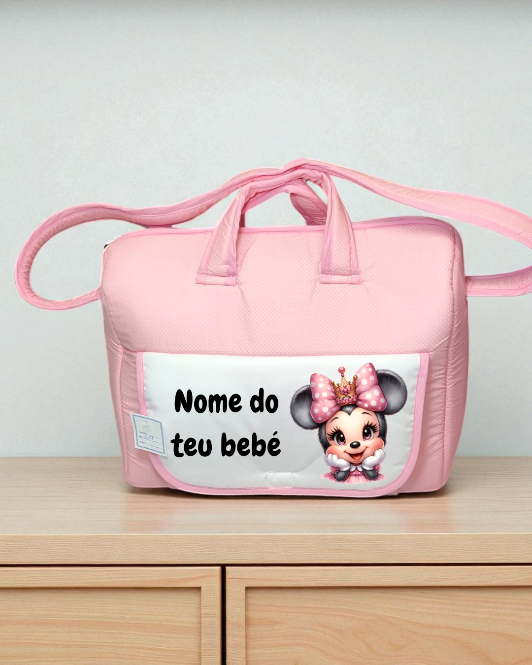 Mala de bebé cor-de-rosa com desenho de bebé rato e texto 'Nome do teu bebé'