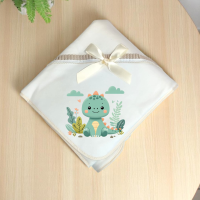 Manta branca para bebé com desenho de dinossauro verde e fita de cetim creme