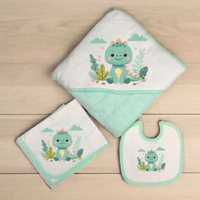 Conjunto de bebé com desenho de dinossauro azul em tecido verde e branco
