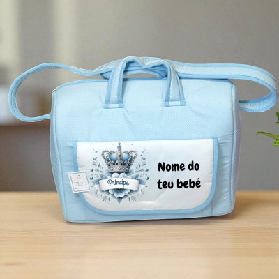 Mala azul para bebé com bolso frontal branco e coroa azul