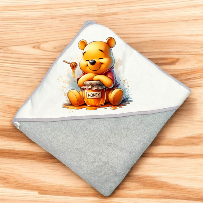 Toalha de bebé cinza e branca com estampa do Ursinho Pooh e pote de mel