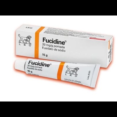 Pomada Fucidine 15 g com embalagem branca e laranja e ilustração de leão preto