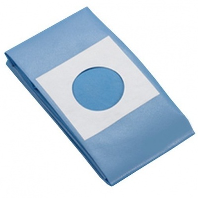 tecido azul dobrado com adesivo branco e corte redondo