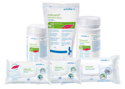Seis embalagens de lenços umedecidos mikrozid da schülke, em vários formatos brancos com detalhes azuis e verdes.