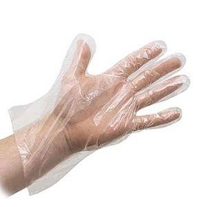 Mão com luva descartável transparente