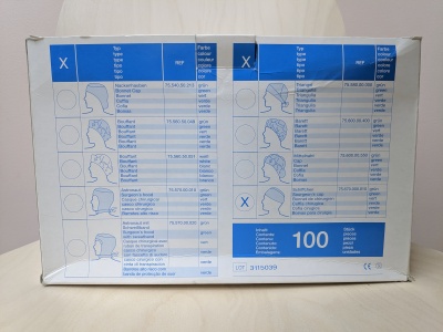 Caixa branca com etiquetas azuis e tabelas informativas