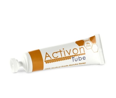 Frasco tubular branco e castanho com texto Activon Tube e embalagem em fundo branco