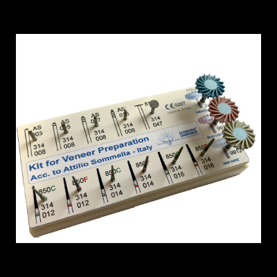 Kit para preparação de facetas dentárias com várias brocas em caixa branca.