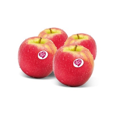 Quatro maçãs vermelhas com autocolantes Pink Lady