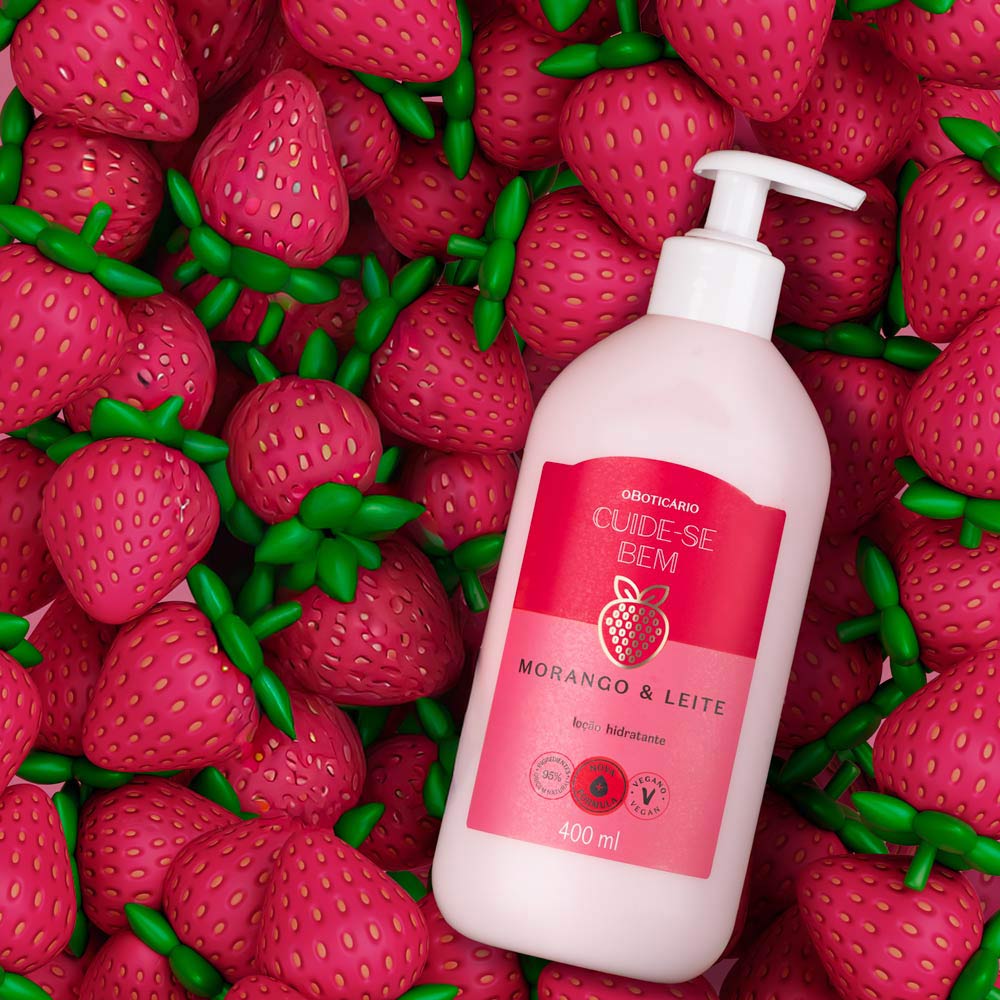 Loção Hidratante Corporal Cuide-se Bem Morango e Leite 400ml Frasco rosa de loção hidratante morango e leite entre morangos vermelhos