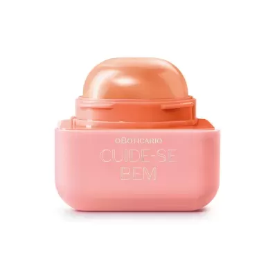 Embalagem rosa de produto cosmético com tampa cor de pêssego e texto doBoticário Cuide-se Bem