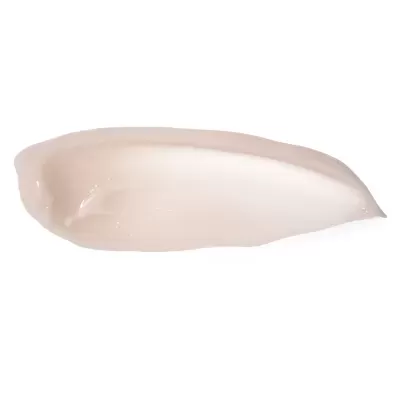 Amostra de creme hidratante bege claro sobre fundo branco