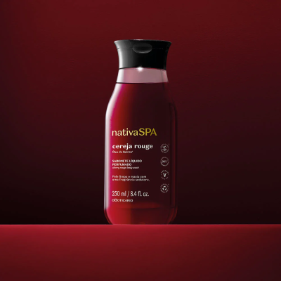 Frasco de sabonete líquido vermelho com tampa preta e rótulo branco e amarelo